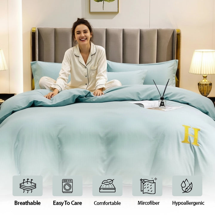 Soft green bedding showing bed sheet, quilt cover, and pillow cover with smooth finish