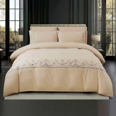 Elegant beige king bedding set with embroidered design