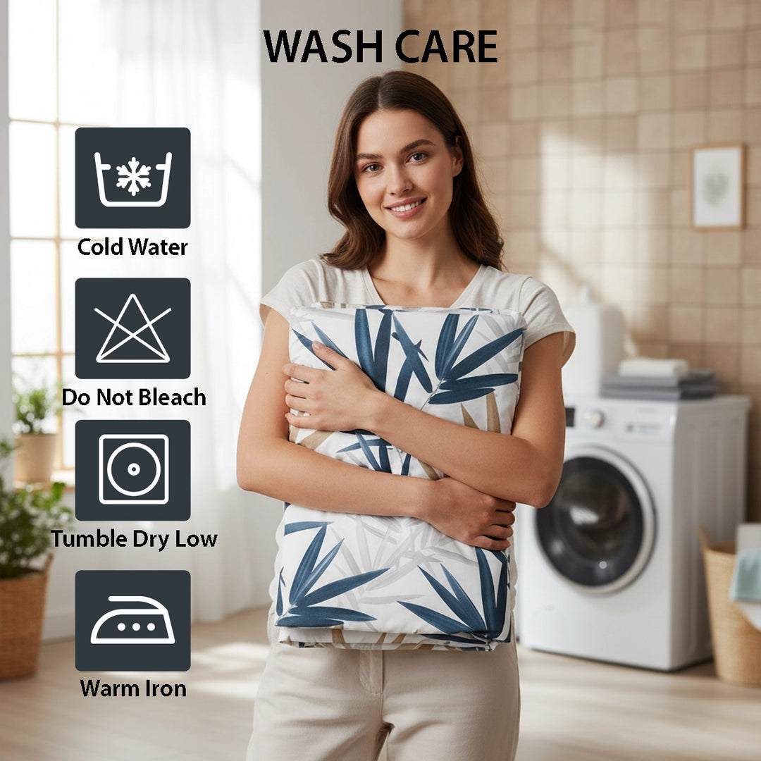 White bedding layered with leaf pattern bed sheet, quilt cover, and pillow cover