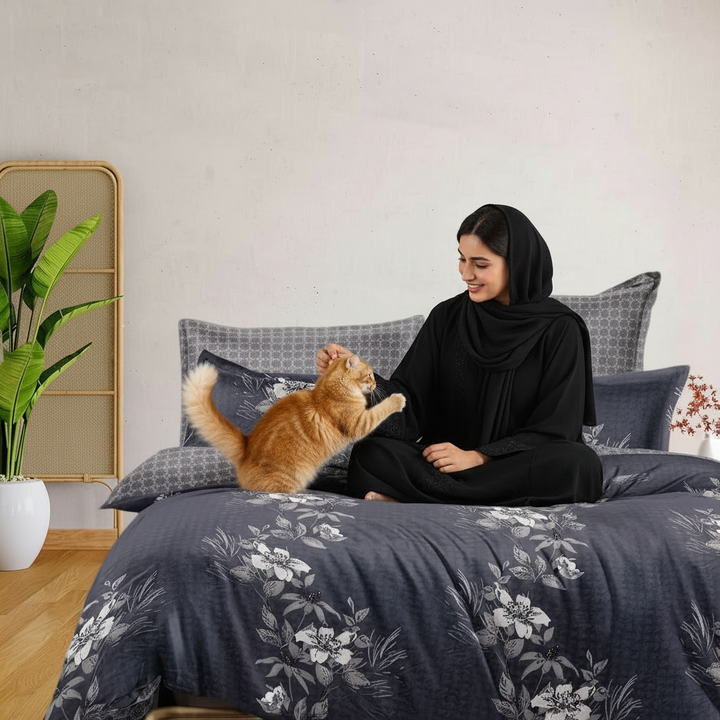 Modern grey single bedspread with tropical leaf design