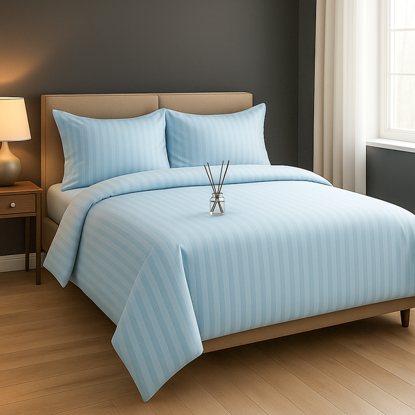 Bed with light blue striped bedding set with pillowcase