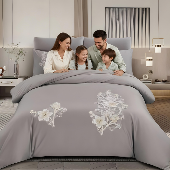 Soft gray bedsheet set with detailed floral embroidery
