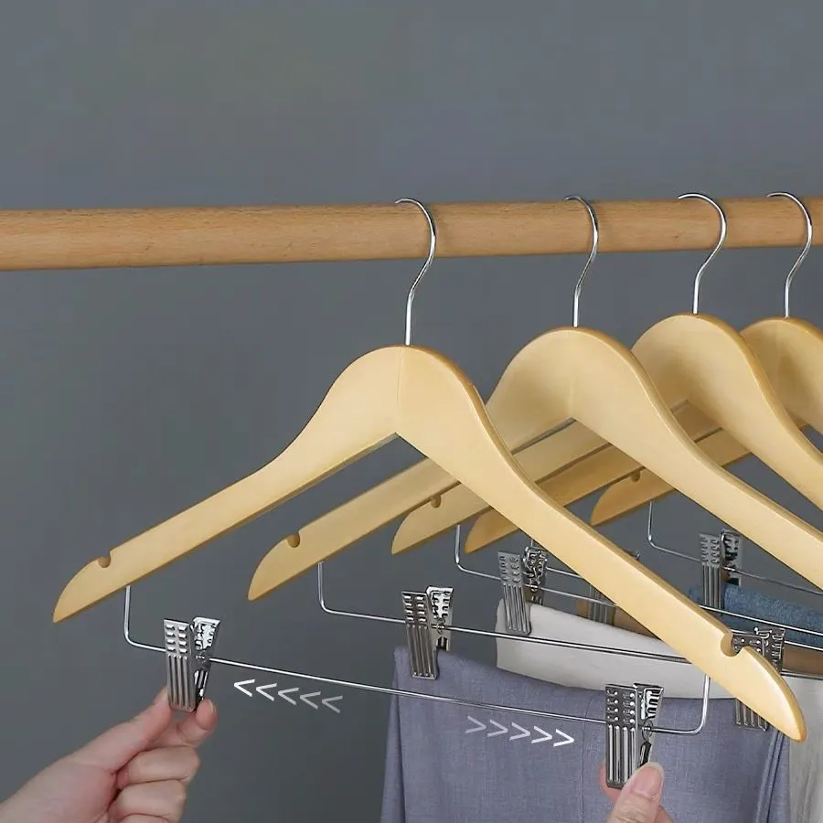 Wooden garment hangers with silver metal hooks